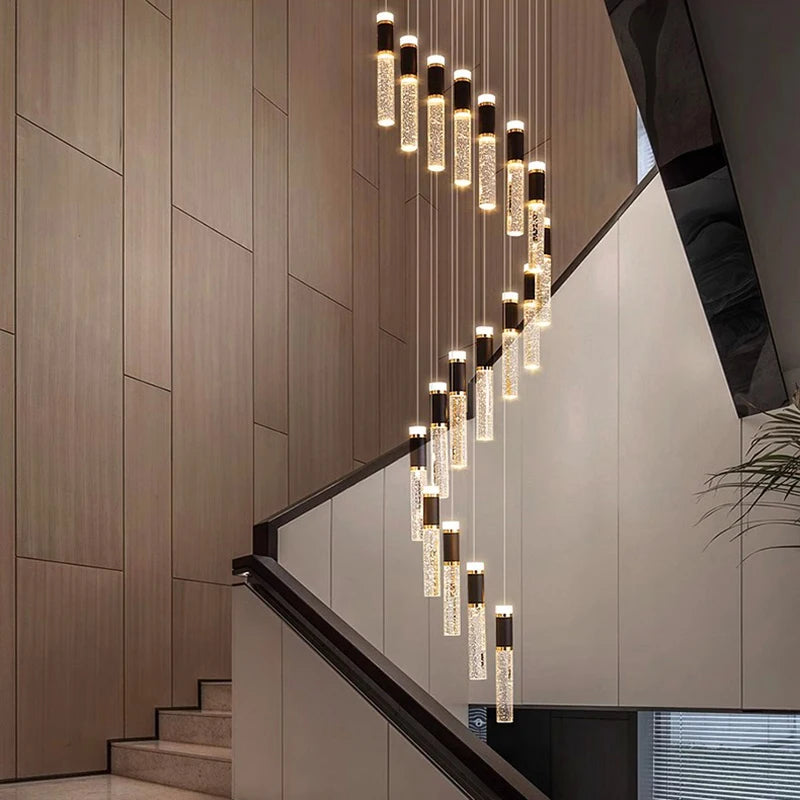 Modern crystal chandelier with clear crystal-encrusted cylindrical pendants and black metal accents for luxury lighting