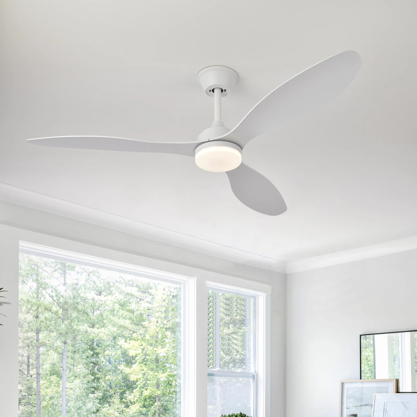 Low-profile white ceiling fan with three sleek blades and integrated circular light fixture with remote control