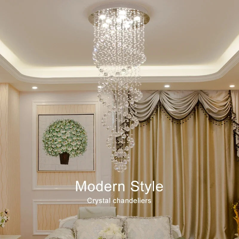 A modern spiral crystal led ceiling chandelier with clear faceted crystals in a cascading design