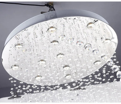 Spiral crystal led ceiling chandelier with a circular silver frame and dangling clear glass orbs for modern lighting