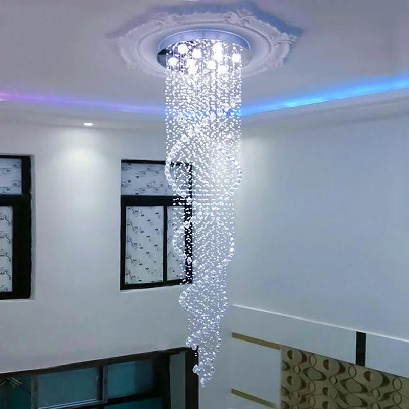 A spiral crystal LED ceiling chandelier with cascading clear crystals and a sleek modern multi-tier design